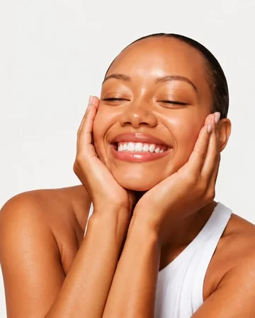 Smiling woman with glowing skin